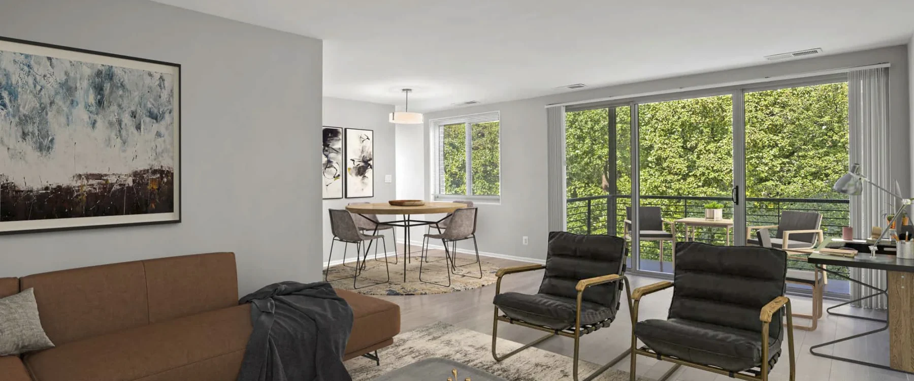 Modern living room with a brown sofa, two black chairs, and a coffee table; dining area seats up to 6. Large windows and sliding doors offer views of the balcony with trees—enjoy natural light in this stylish 90-square-meter space.